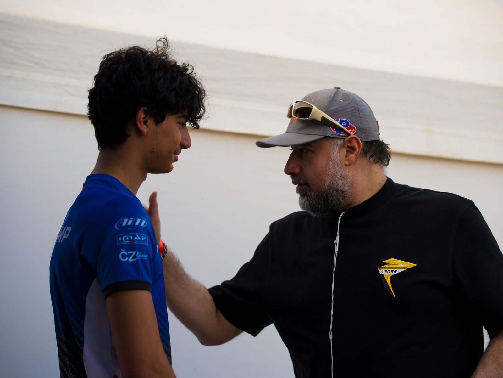 Khalid Al-Najjar talking with his coach