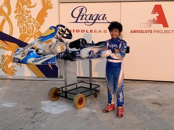 Young Khalid Al-Najjar beside his Praga kart